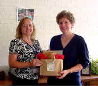 Viki Davis presents Amy Herchet her gift pack...